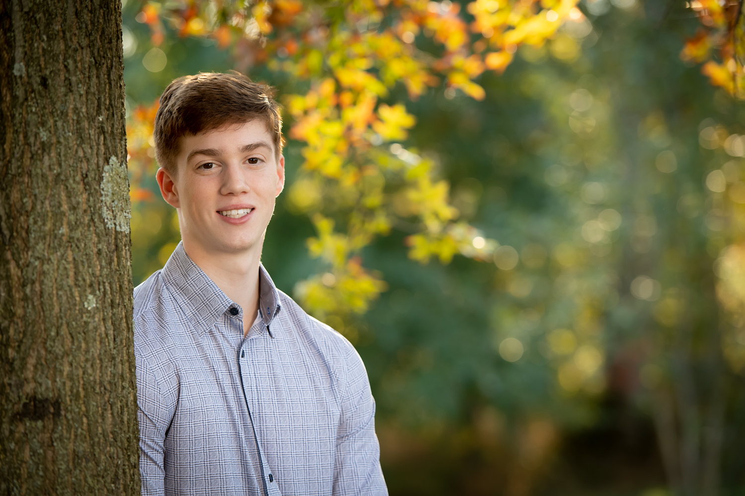 Senior guy pictures outdoors in fall