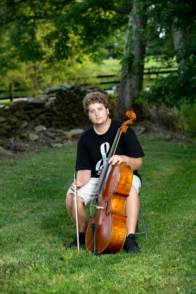 senior boy outdoors cello