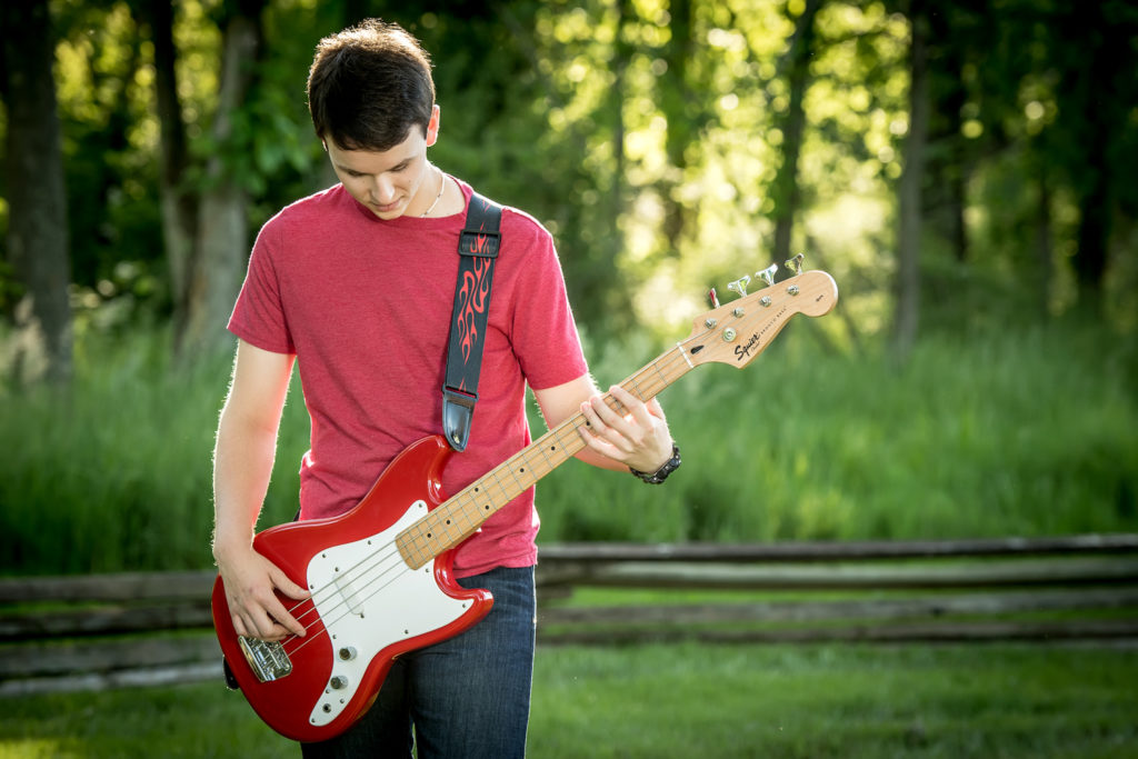 senior boy with guitar