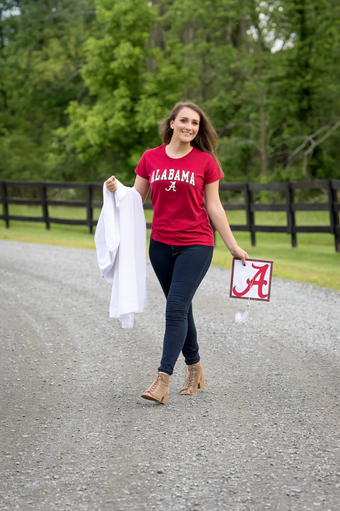 senior girl off to Alabama cap and gown